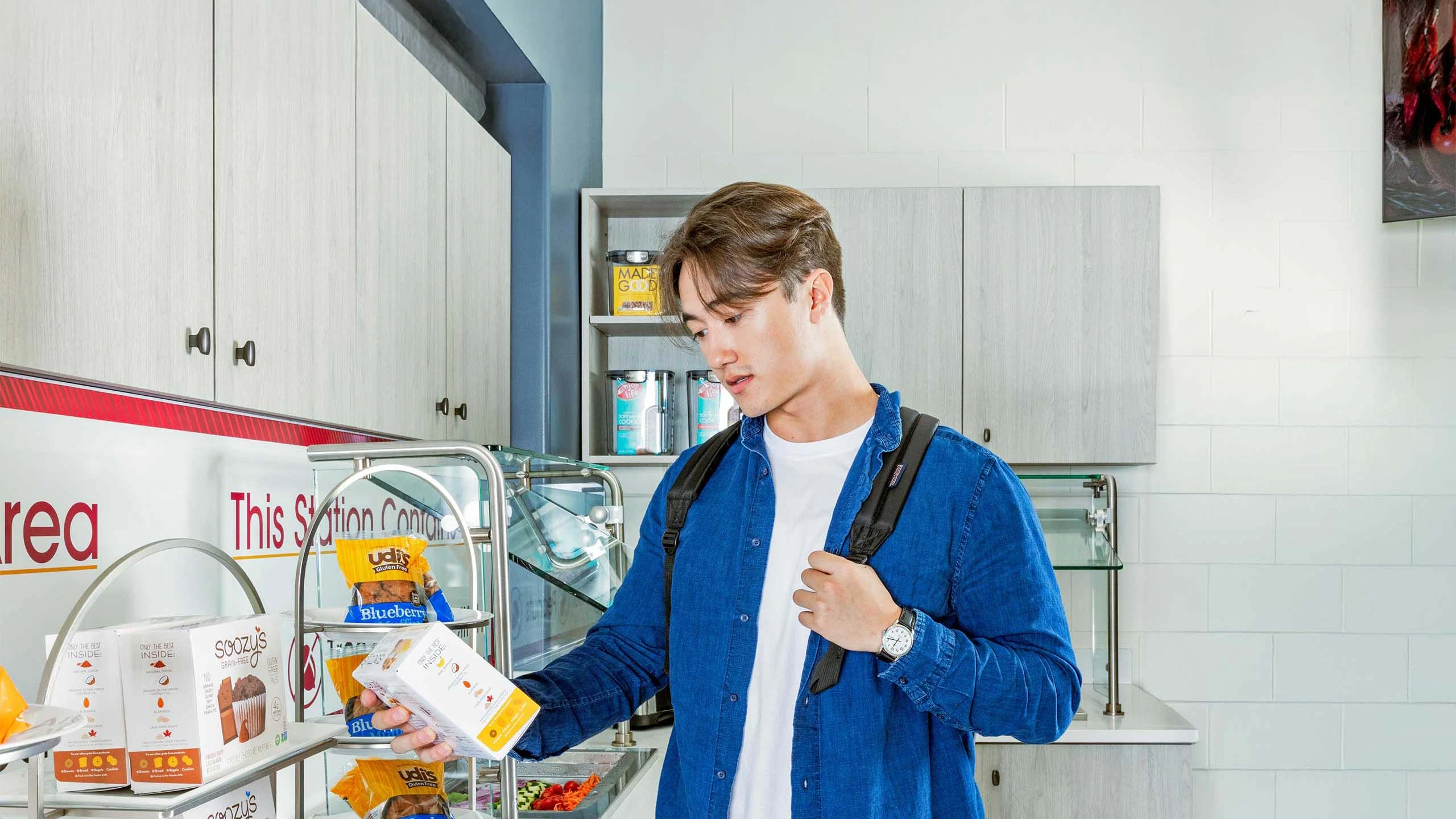 Student examining a package of food